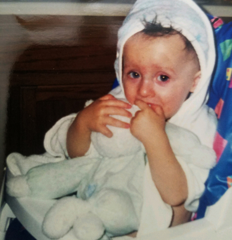 Kayden Reinke holds Lammie