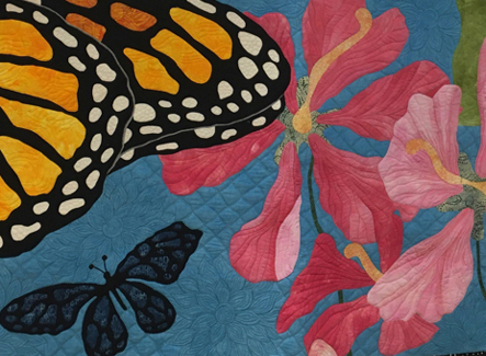 quilt with butterflies and flowers