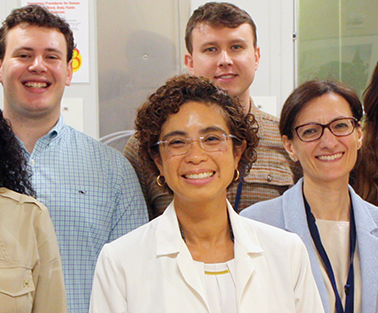 group of people with Dr. Stephanie Chung in the center