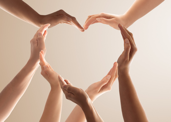 hands grouped togther to shape a heart