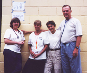 four Clinical Center employees