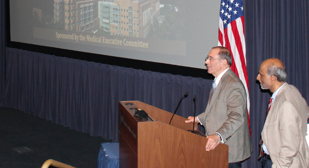 Dr. John I. Gallin (left) and Dr. Avi Nath address Town Hall attendees.