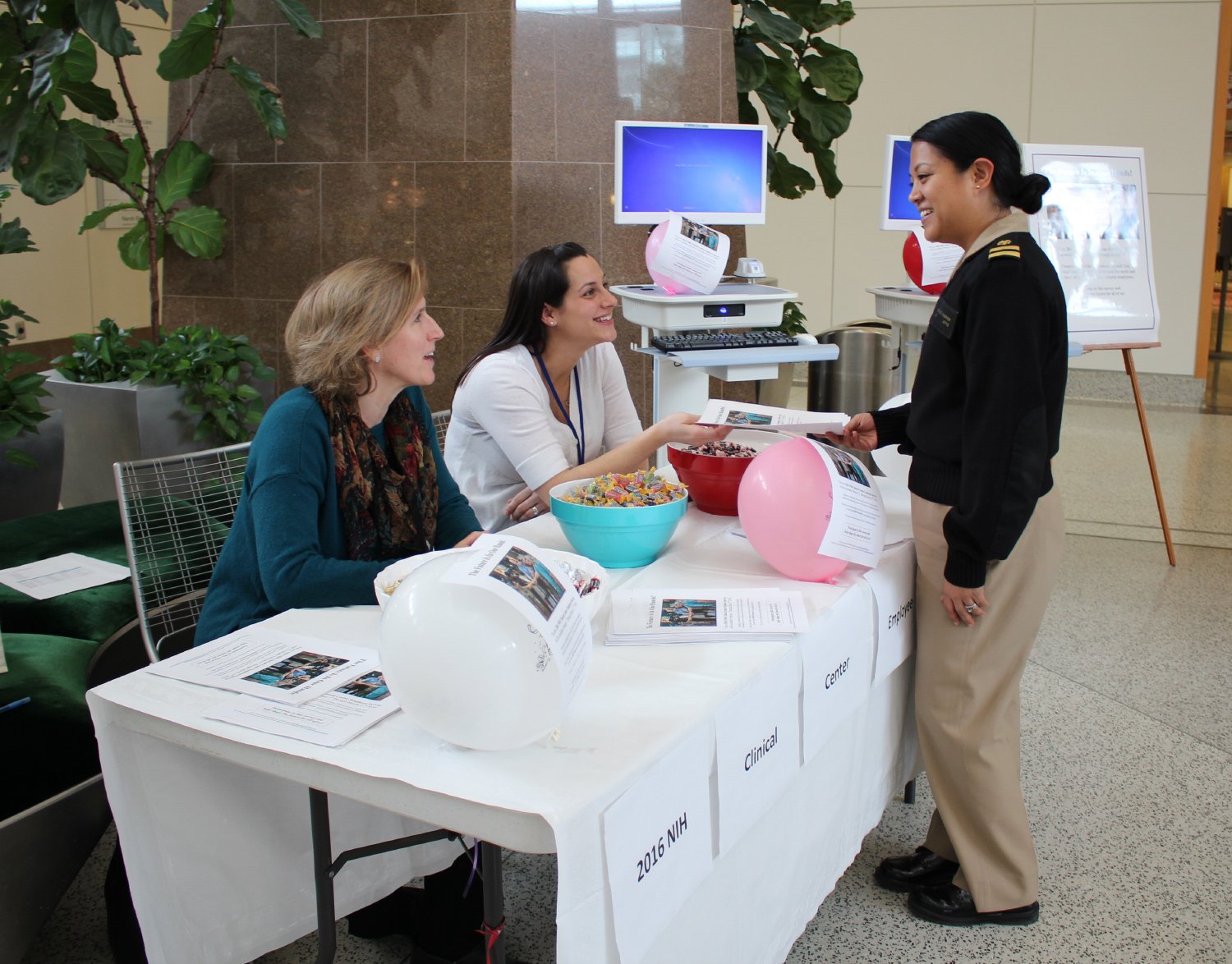 Clinical Center volunteers promoted the survey during a launch in the atrium to help spread the word.