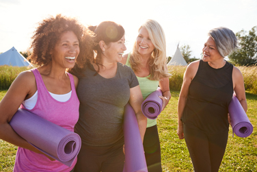 a group of women walking to yoga class