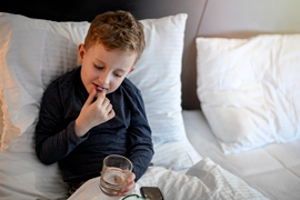 a child taking medication