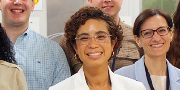 group of people with Dr. Stephanie Chung in the center