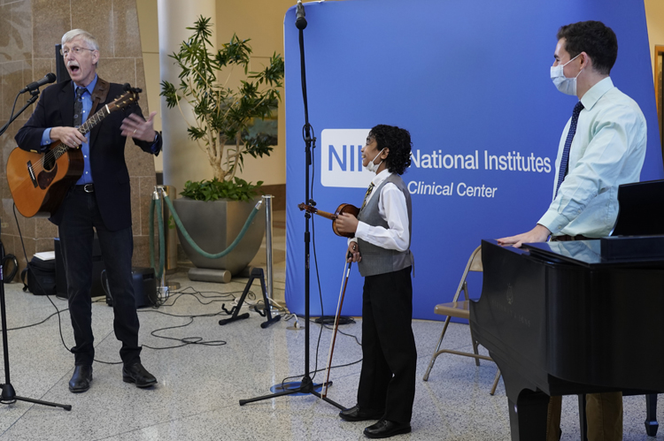 Concert featured 13-year old Caesar Santos on violin, NIH Director Dr. Francis Collins on guitar
