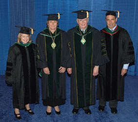 Dr. John I. Gallin (far right) is joined by (l to r) fellow award winner Susan Hou, ACP Board of Regents Chair Donna Sweet and ACP President C. Anderson Hedberg. 