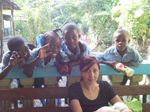 Sila Claure with Haitian children