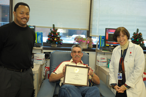 Former employee David Blessley gets certificate from DTM employees