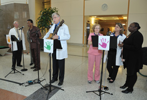 NIH Director Dr. Francis S. Collins and his back-up singers during the I ♥ Clean Hands Day event