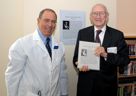 Clinical Center Director Dr. John I. Gallin presenting an award to Jim Butler