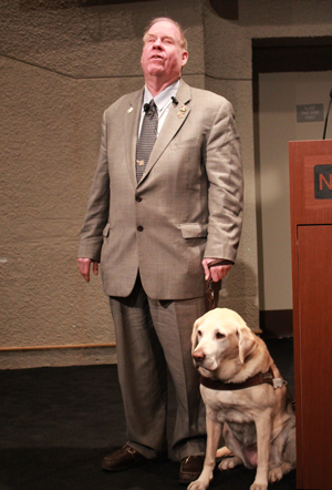 9/11 Survivor with his service dog