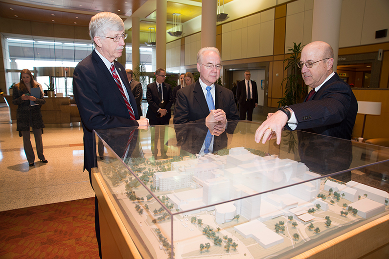 Dr. James Gilman (right), CEO of the NIH Clinical Center, describes the layout of the hospital to the new Secretary of the Department of Health and Human Services Dr. Thomas E. Price (middle) with NIH Director Dr. Francis Collins during the secretary's visit to the NIH campus Feb. 21.