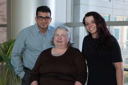 Yogesh Kalotra (left), Deborah Crawford (center) and Natalia Sampaio Moura volunteer with the NIH Clinical Center's Volunteer Program.