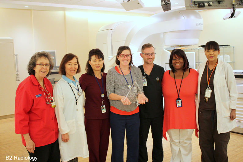 Seven staff gathered in the Radiology on the B2 level of the NIH Clinical Center