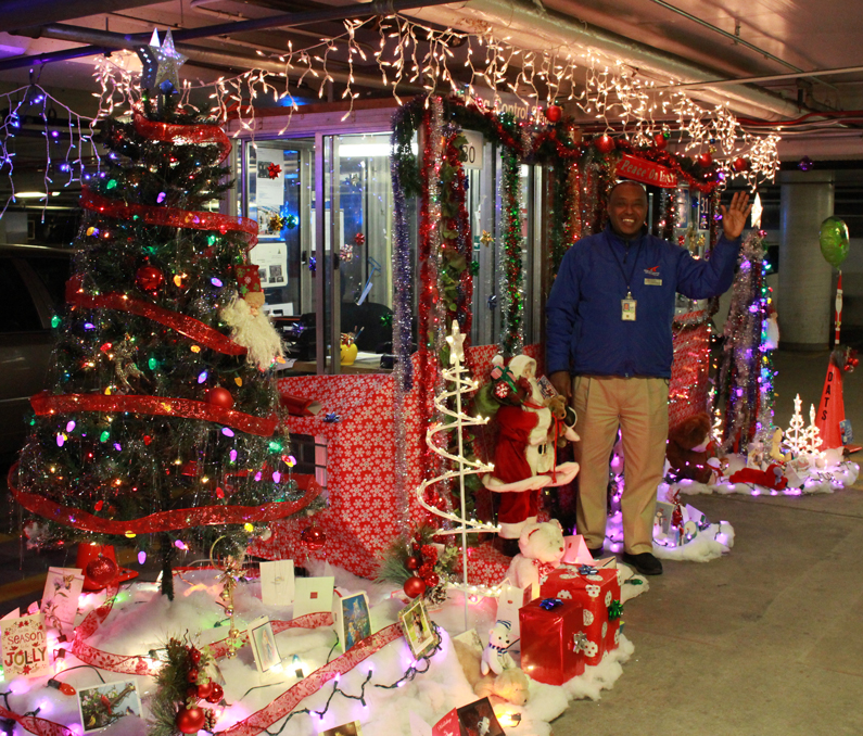 Parking Garage attendant's booth decorated with lights