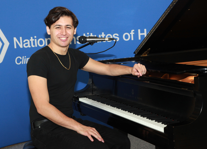 Singer-songwriter and pianist Chris Urquiaga performs in CC Atrium