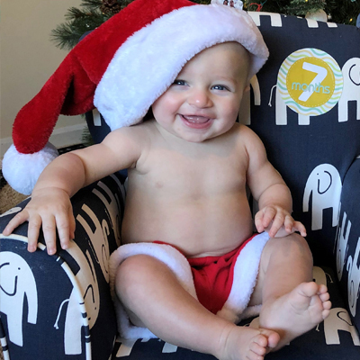 a baby in a holiday outfit