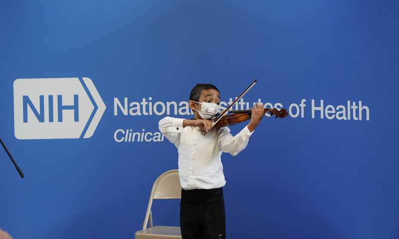 Caesar Santos performing in the NIH CC