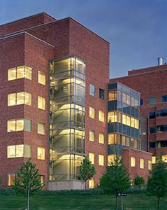 Exterior shot of the Clinical Center building at night.