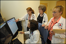 Staff review images each morning as a team to enhance patient care and training.
