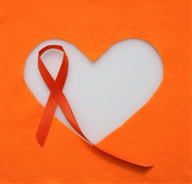 cut-out felt heart with orange ribbon